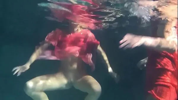 Prikaži Two hot lesbians underwater touching each-other. y. s are naked in the pool. Young nudists skupaj filmov